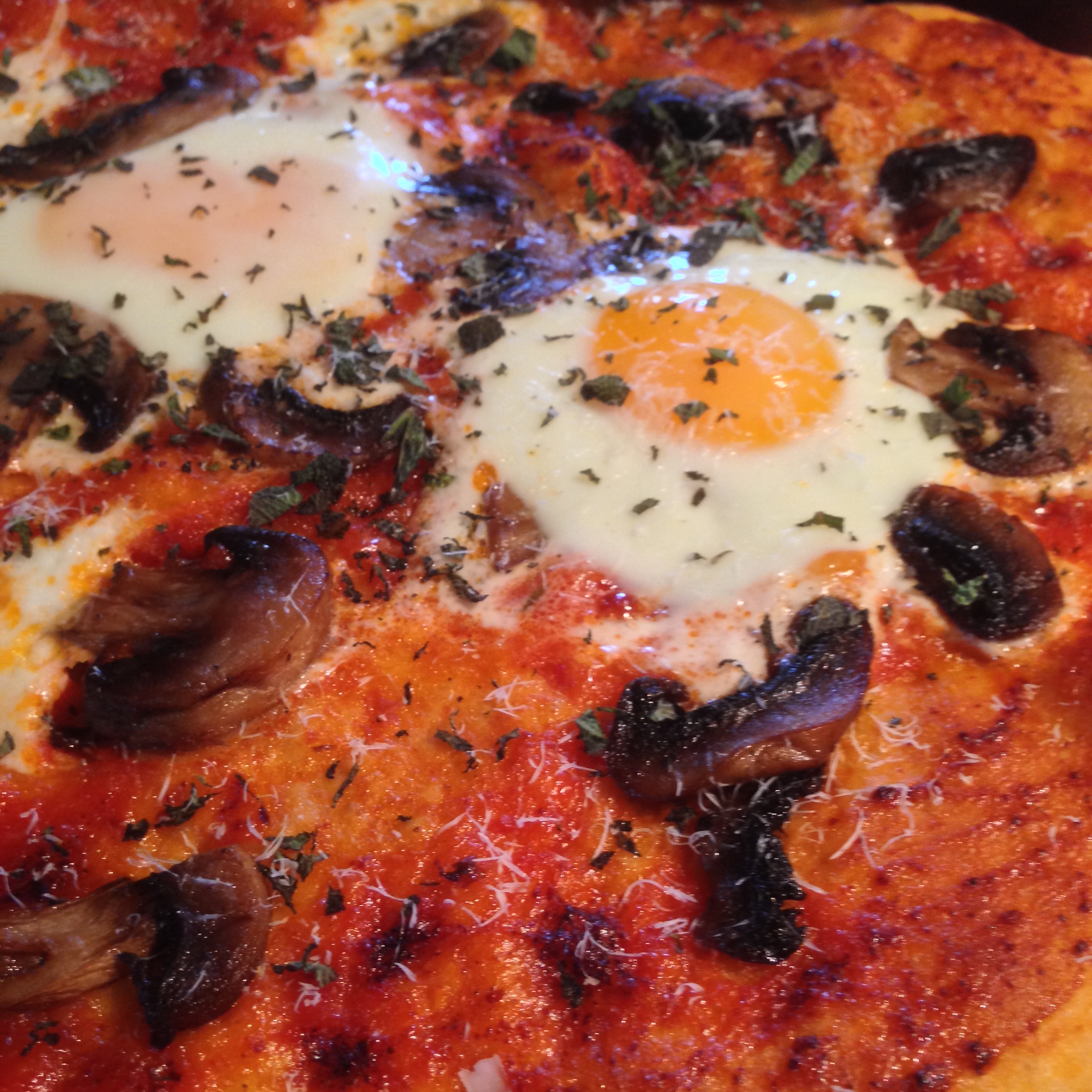 sage and buttered egg pizza with fresh mushrooms