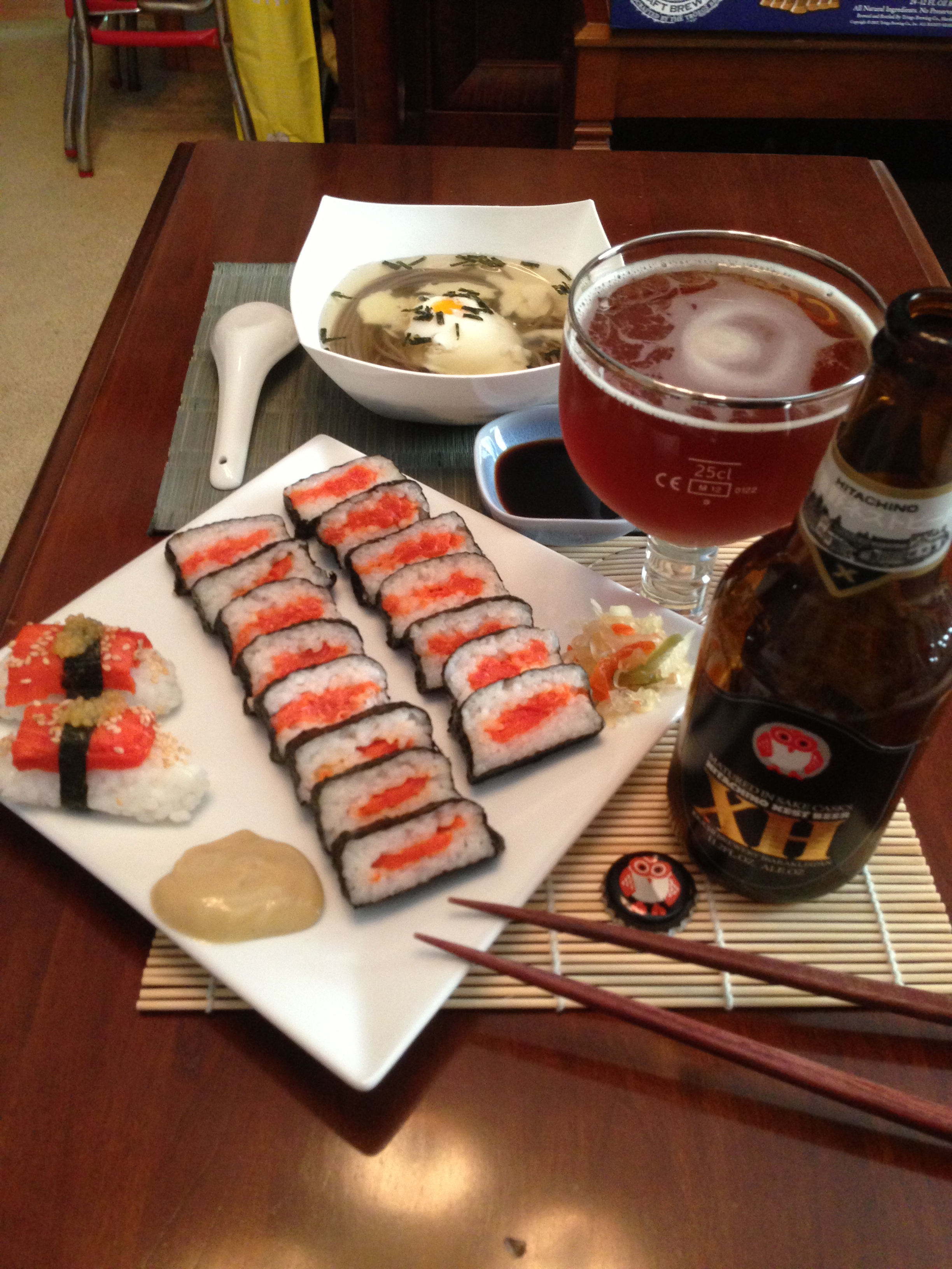 Salmon Oshizushi and Nigiri Sushi with Tsukimi Soba Noodle Soup Close Up