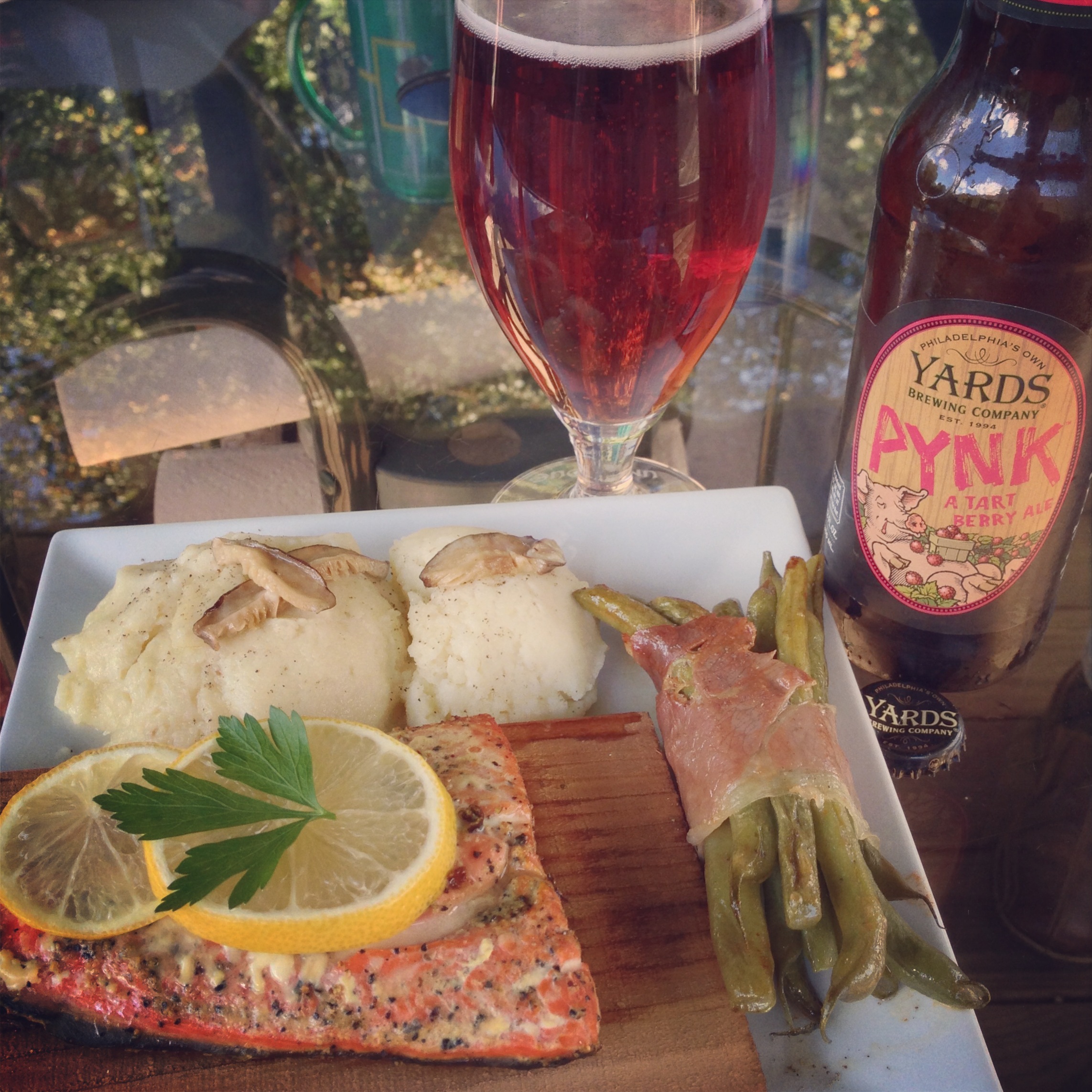 Cedar Plank Grilled Salmon, Pommes de Terre Forestieres, and Prosciutto Green Bean Bundles