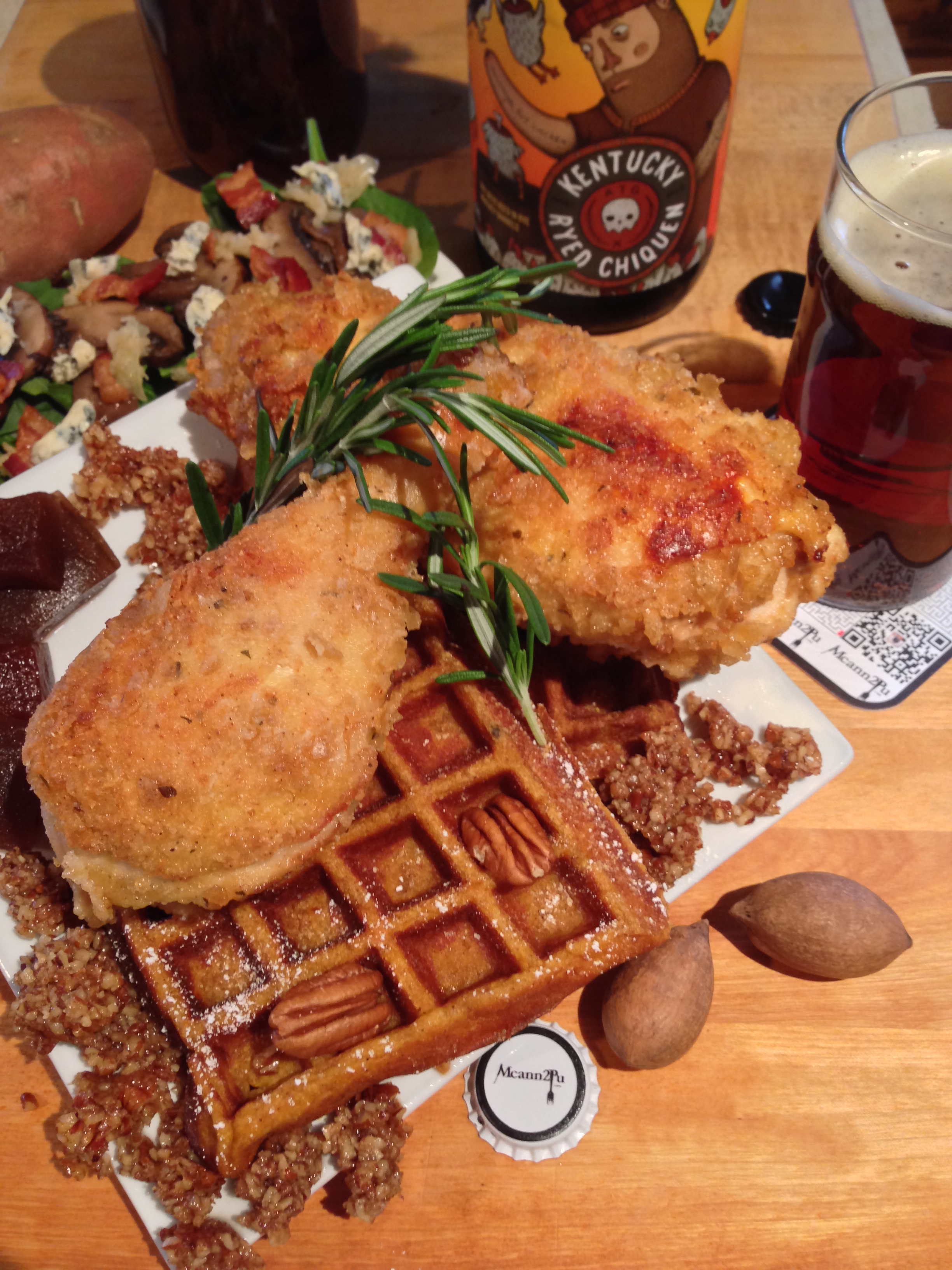 Buttermilk Fried Chicken on Sweet Potato Wafles sprinkled with a Pecan Crumble