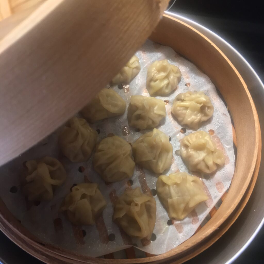 steaming chicken dumplings